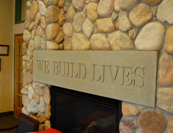 We Build Lives Fireplace