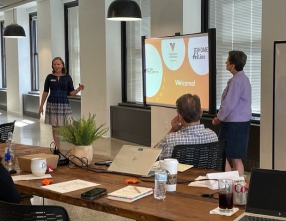 two women giving a presentation 