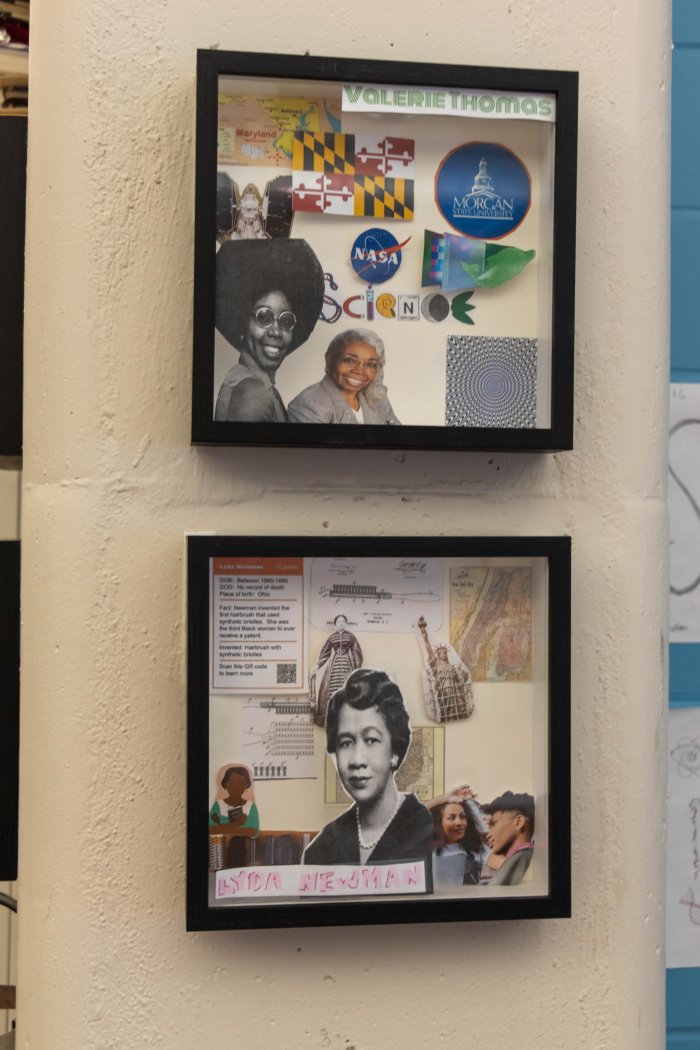 two shadowboxes hanging on a wall highlighting two different inventors