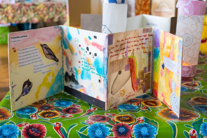 A project of a student that features a collage of images, colors, and poetry