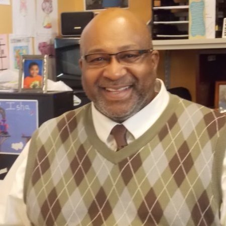 portrait of an older adult male smiling