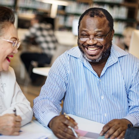 a smiling and happy older male 