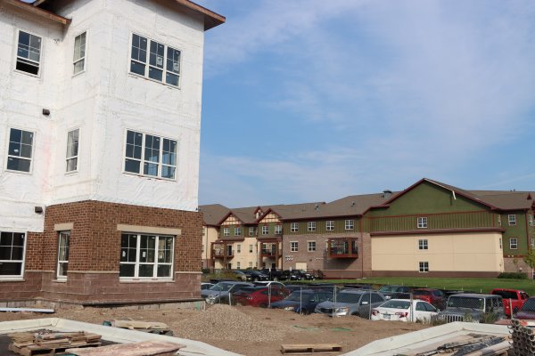 exterior shot of apartment buildings next to each other